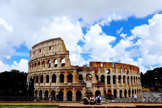 Rome: Colosseum, Roman Forum & Trajan's Market Exterior Tour - Colosseum from the outside: engineering, spectacles, and crowd noise (minus the ticket line)