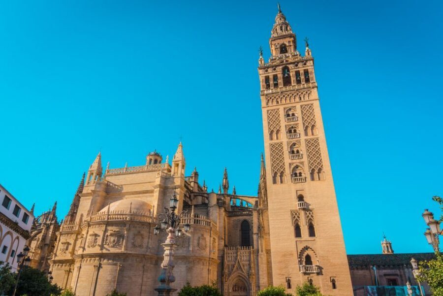Seville: Alcázar, Cathedral & Giralda Fast Track Guided Tour - Seville Cathedral and Patio de los Naranjos: architecture you can feel