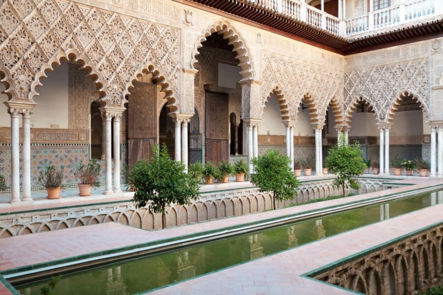 Seville: Alcázar, Cathedral & Giralda Fast Track Guided Tour - Where you meet: Plaza del Triunfo and the orange umbrella