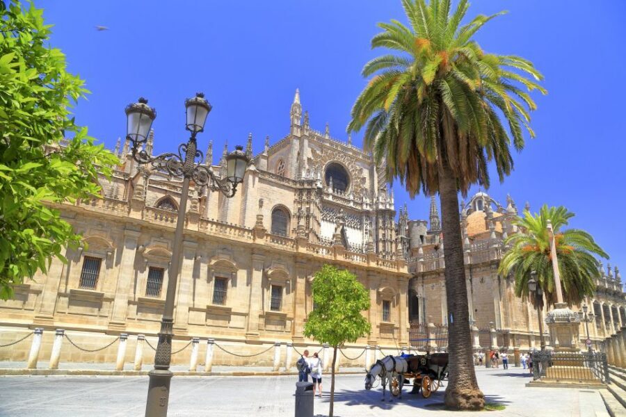 Seville: Cathedral, Giralda & Alcazar Entry With Guided Tour - Seville Cathedral: holy-space rules, standout architecture, and Giralda views