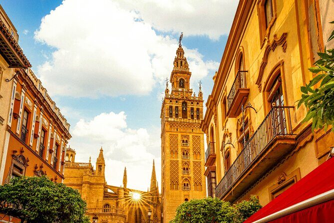 Skip the Line Seville Alcázar, Cathedral & Giralda Guided Tour - Seville Cathedral and Columbus’s tomb: scale and symbolism