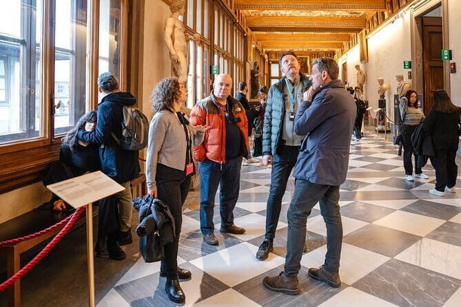 Uffizi Gallery Tour with Botticelli & Michelangelo - Upper-floor Florence views: a small break with big payoff